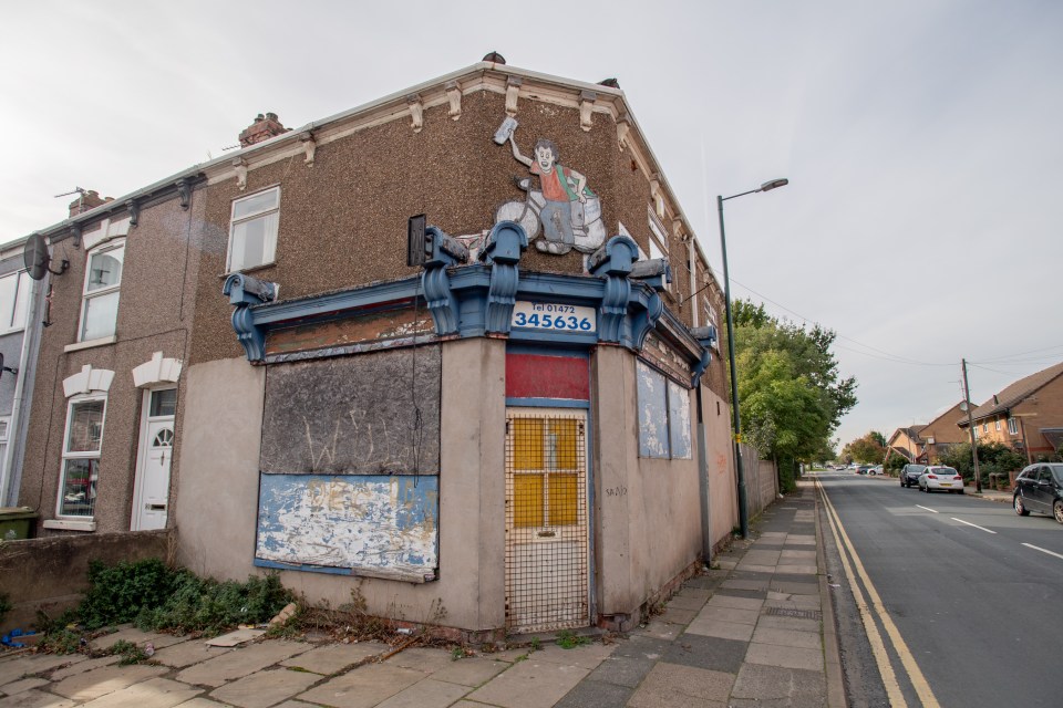 The streets are lined with boarded up shops and houses