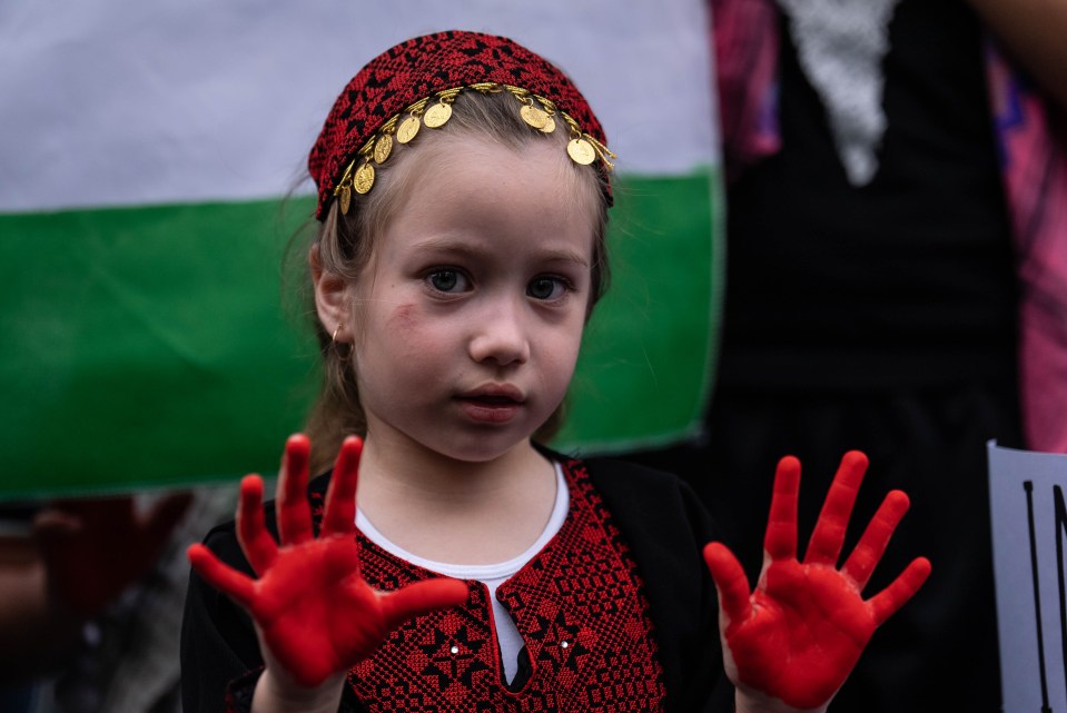 In Chile, children painted their hands red for the many kids who have died in Gaza