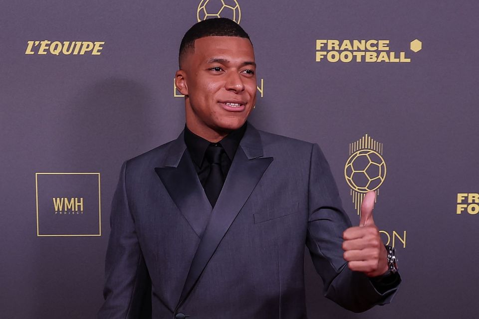 Kylian Mbappe went for a classy grey number