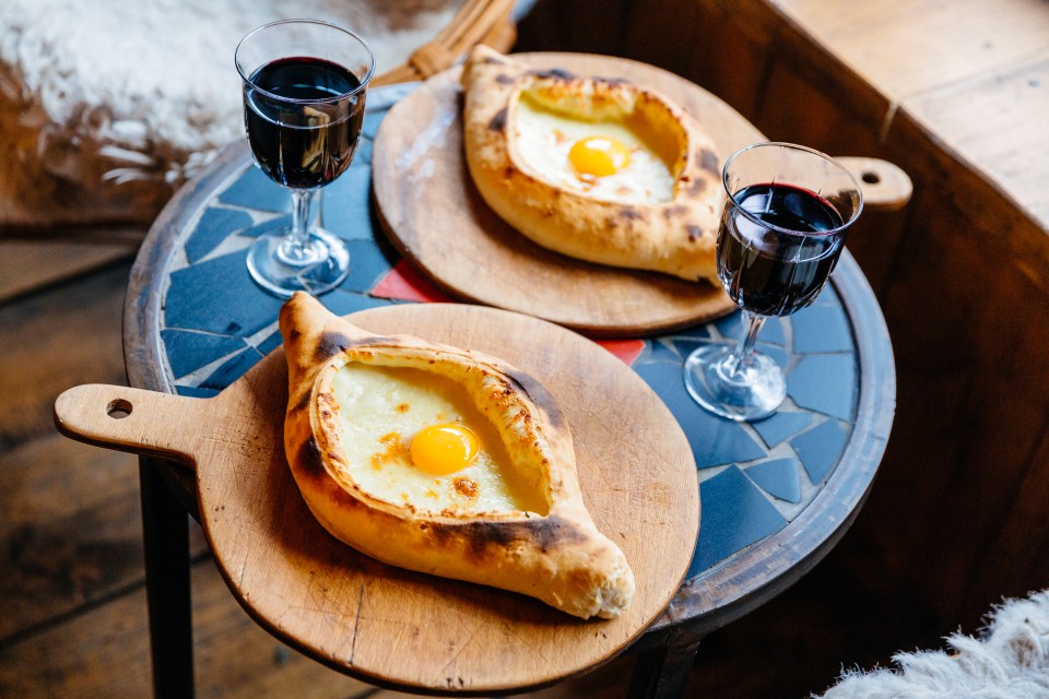 Khachapuri is a popular Georgian food and consists of bread with cheese and an egg