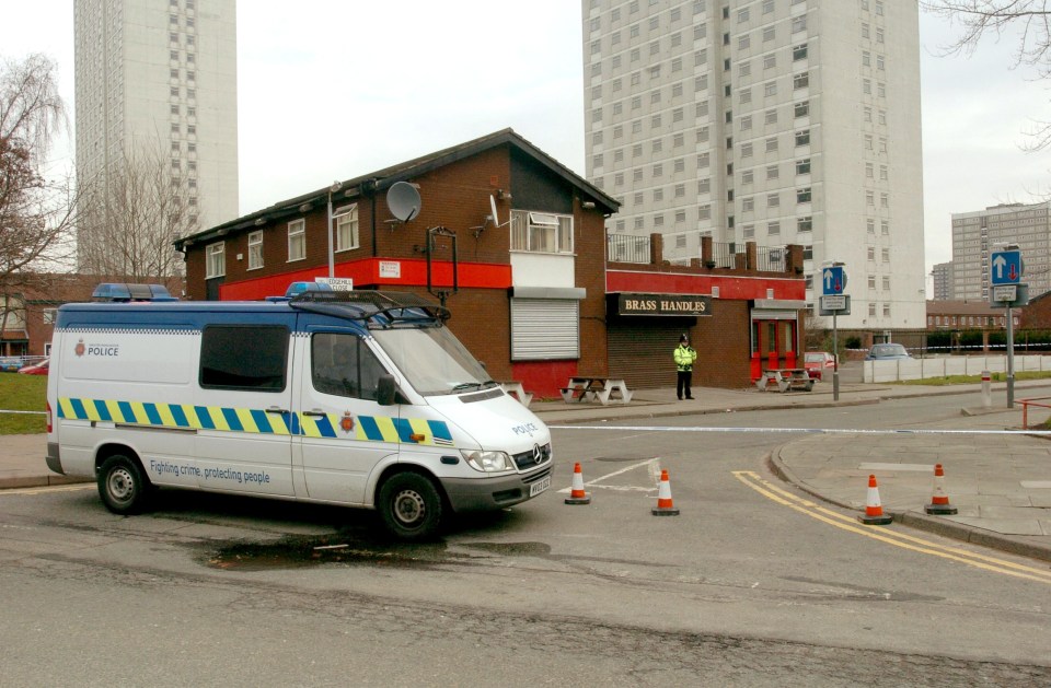 Police at the scene of the shooting at the Brass Handles pub in Salford, Greater Manchester in March 2006