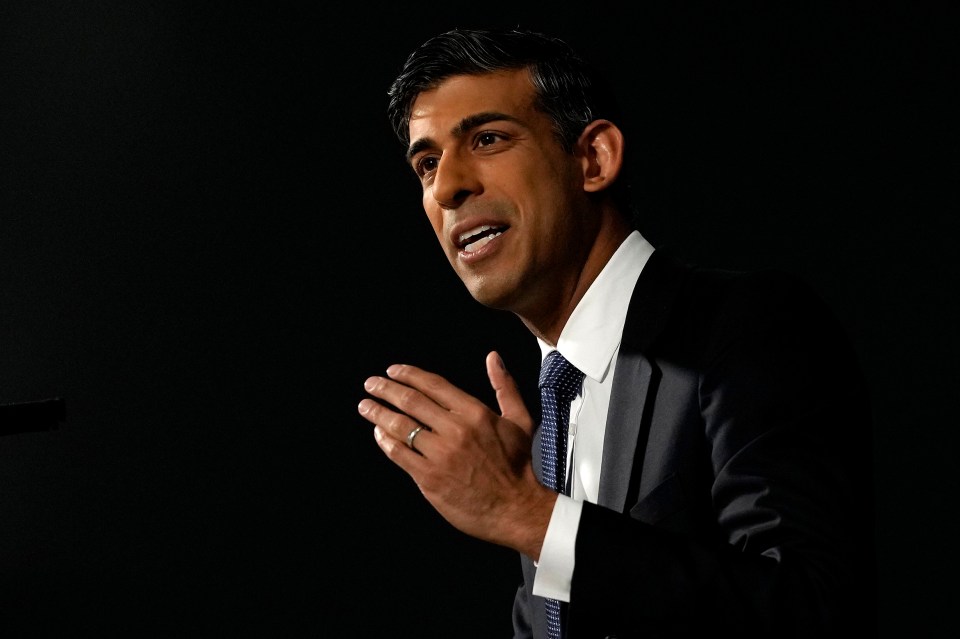 Rishi Sunak pictured delivering a speech in April 2023