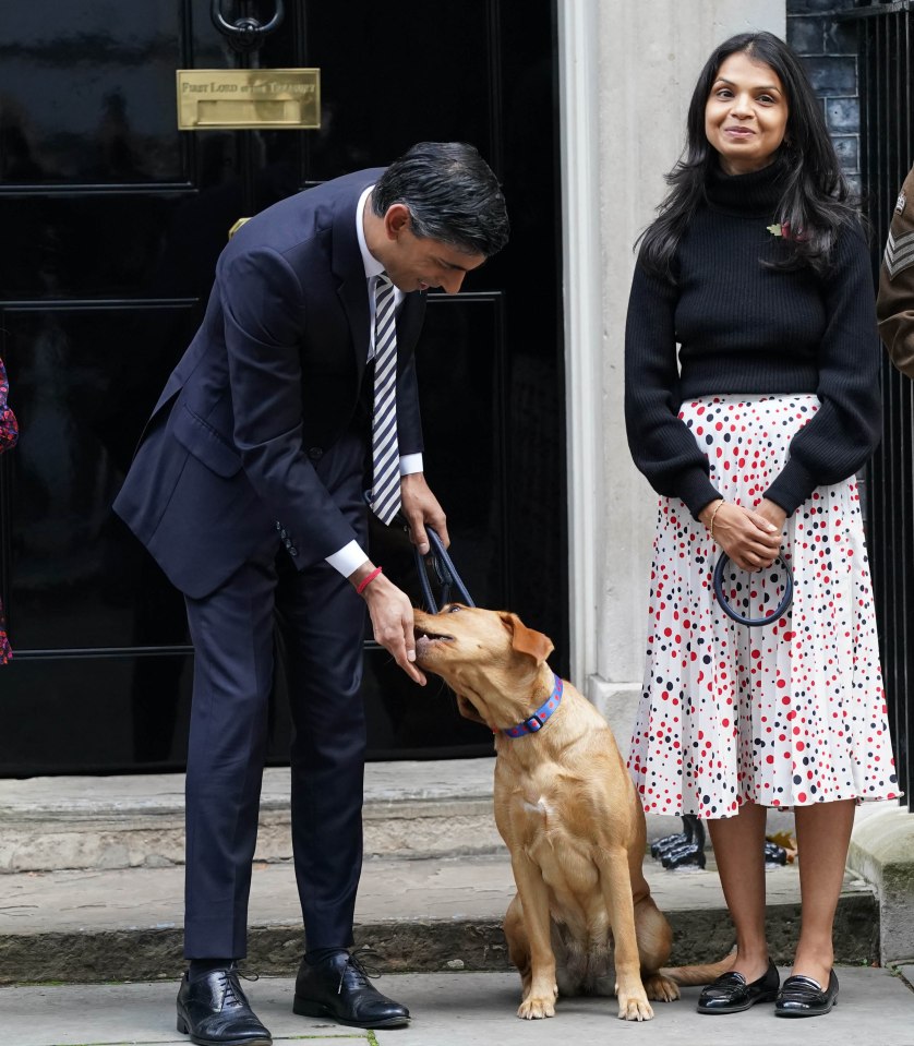 The PM outside No 10 Downing Street with his wife Akshata and their family dog Nova