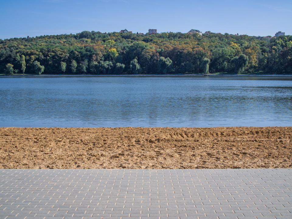 While landlocked, it does have a sandy city beach which is man-made