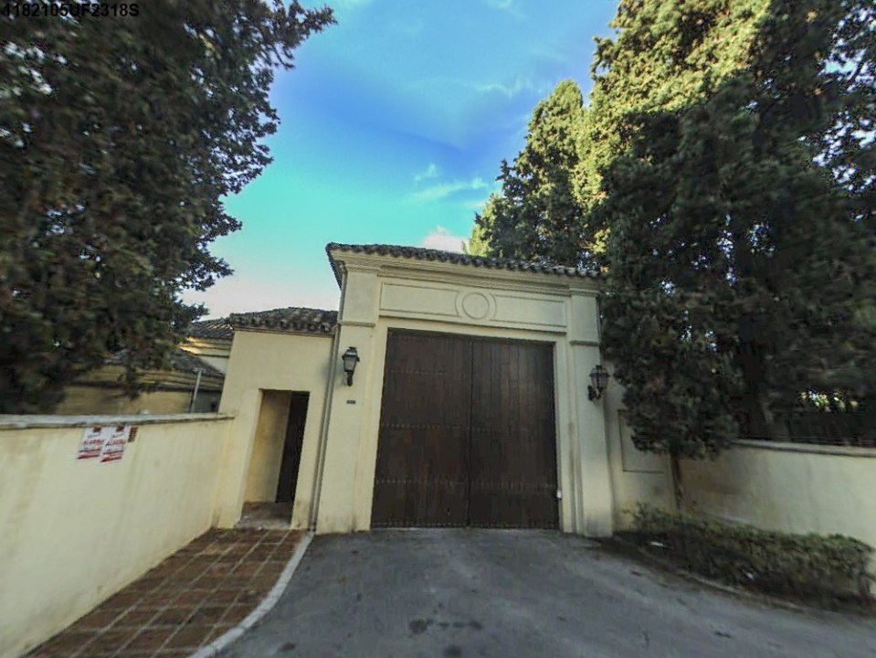 The imposing gates that lead to the oligarch's secret pad in Malaga