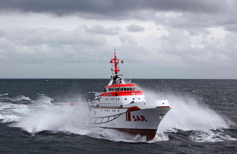 Several other vessels and a German navy helicopter are also at the scene as rescue ship Hermann Marwede (pictured) coordinates the search