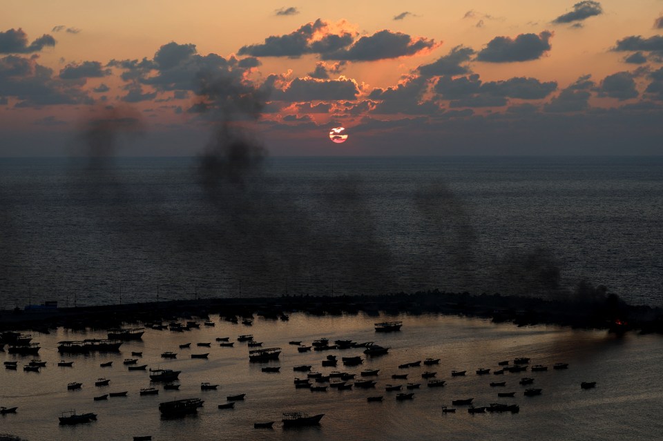 Smoke rises after Israeli strikes on Tuesday in the seaport of Gaza City