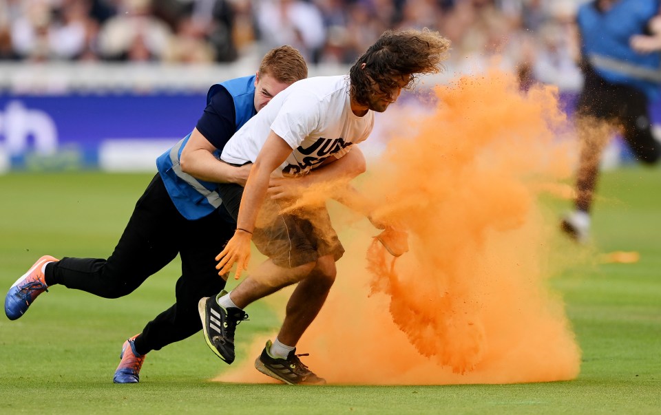 Jacob Bourne threw orange powder paint before he was caught by security