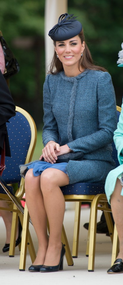 The mum-of-three looked incredible as she sported the tweet coat - as did the other guest who was wearing the exact same outfit