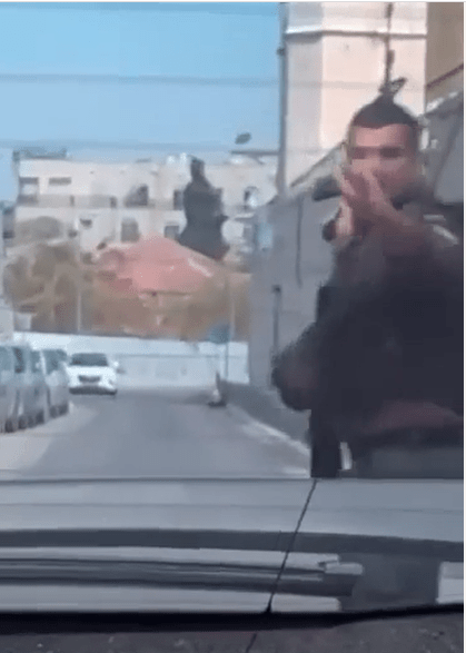 Dash-cam footage of the Israeli police sharpshooter about to fire at the attacker from 50 yards away