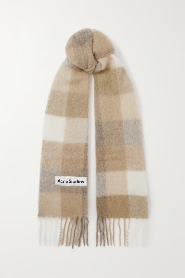 This stylish Acne Studios checked scarf is £240 from Net-a-Porter