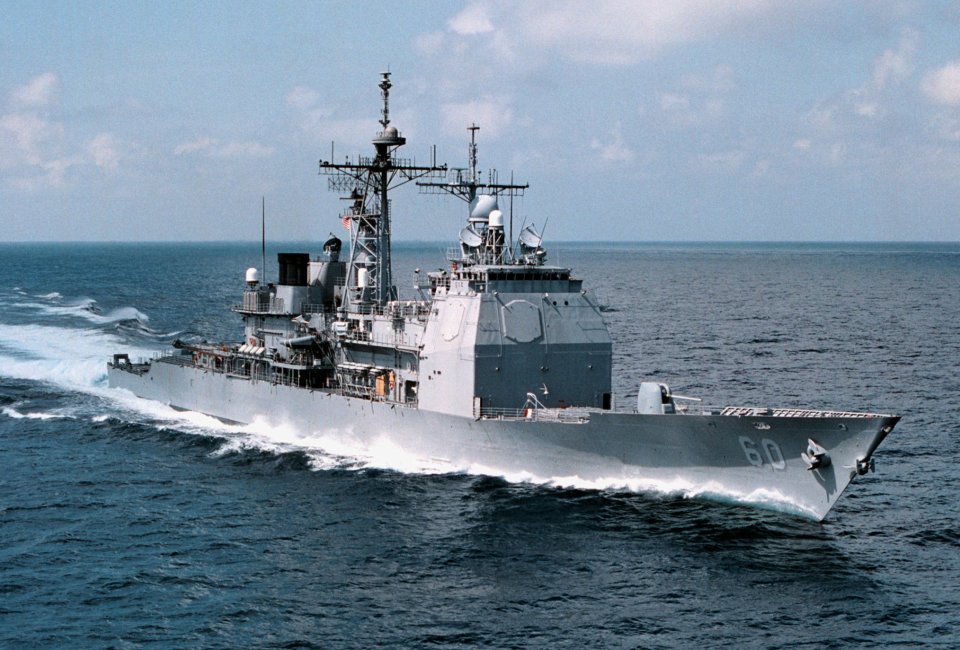 The Ticonderoga class cruiser USS Normandy is a supporting ship to the Ford