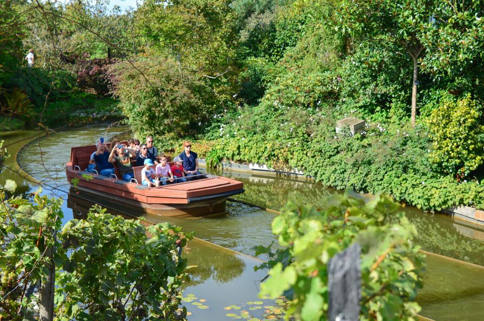 A boat ride shows them the park from a water way running through the park