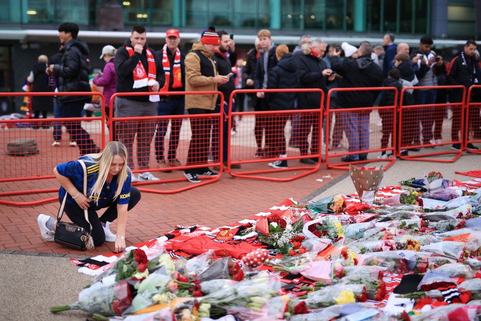 Fans have covered Old Trafford with floral tributes