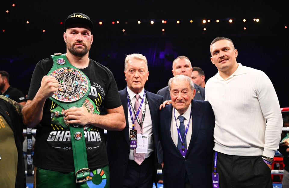 Frank Warren, centre left, has claimed a fight between Fury and Oleksandr Usyk is now unlikely for December