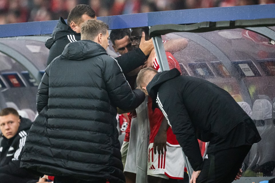 Union Berlin staff members attempt to console David Datro Fofana