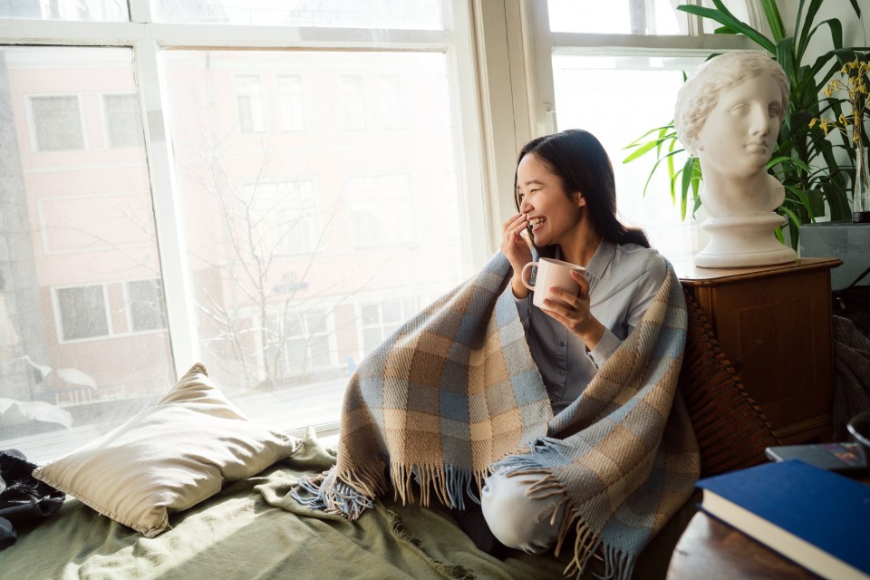 Heated throws can help you avoid turning on the heating in winter