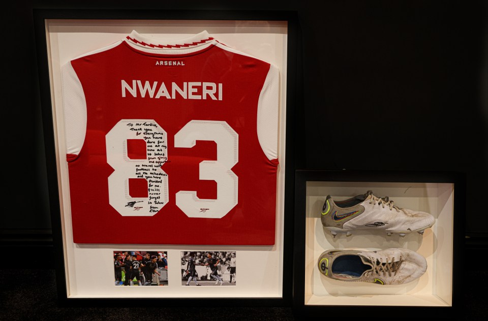 He donated a signed shirt and boots to his old school