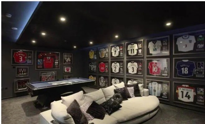 As well as framed football shirts, it included a white leather sofa