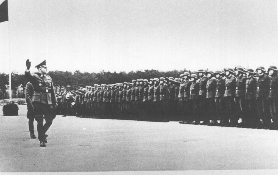 The 14th Waffen Grenadier SS Galizien Division in May 1944 give a Nazi Sieg Heil salute to their commander, the man tracked down by The Sun is believed to have fought with this unit