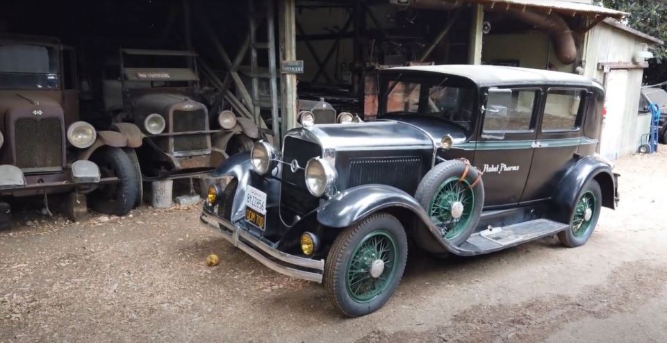 Other vehicles include a Rubel Farms 1929 Studebaker Commander Brougham GJ Six