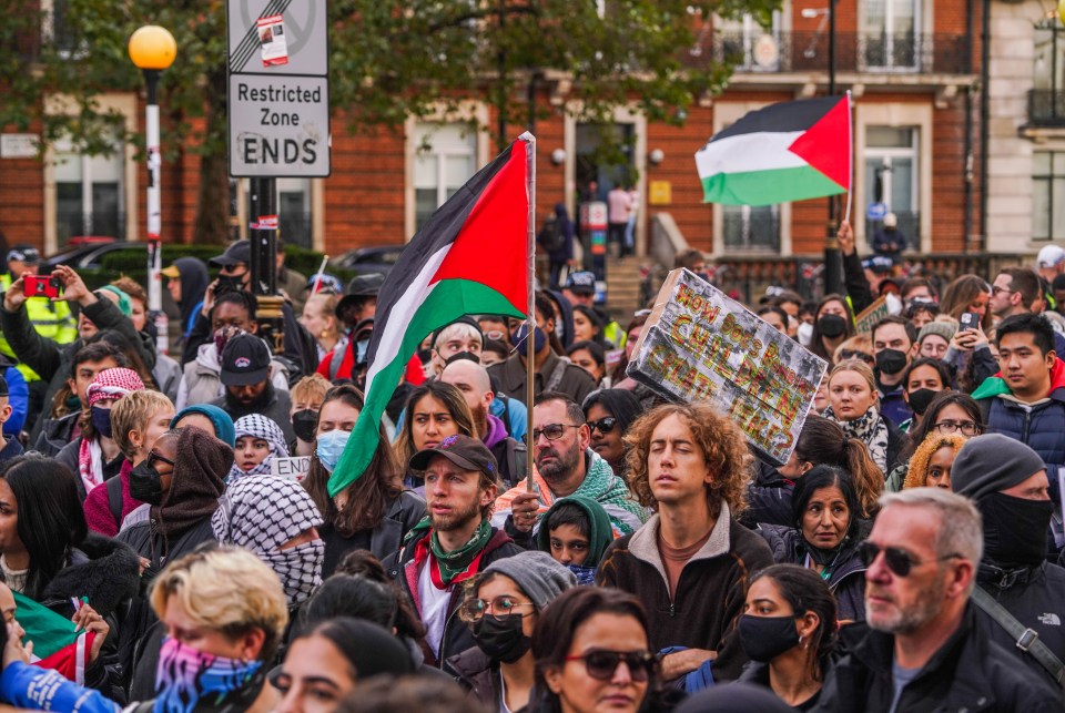 Protesters marching to Trafalgar Square in a day of mass action against the UK government