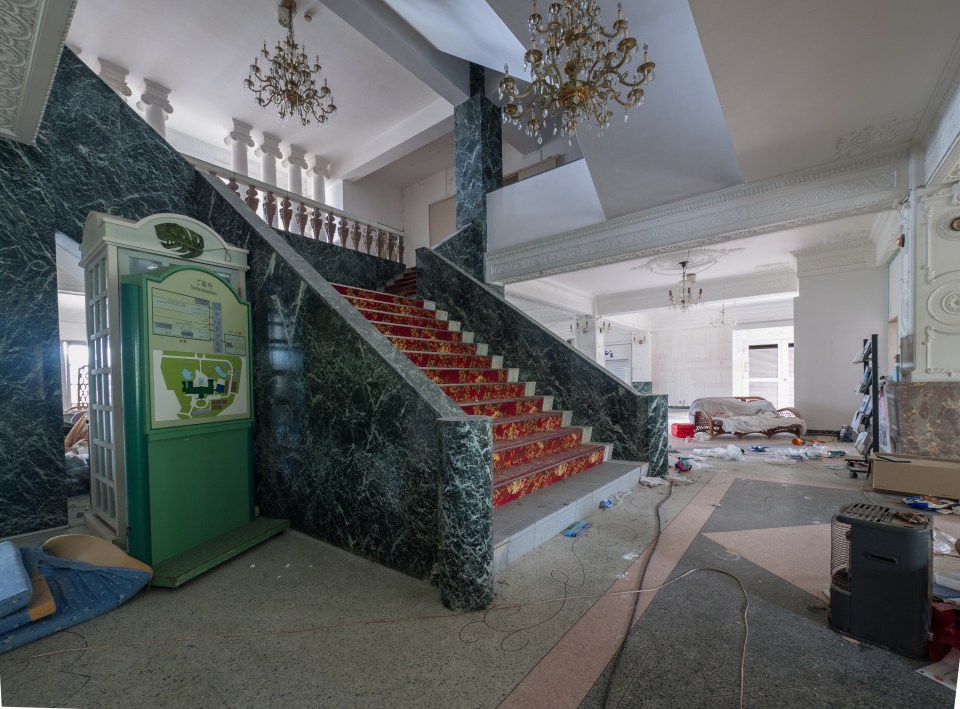 A stairway has retained its grandeur, even after 17 years of abandonment