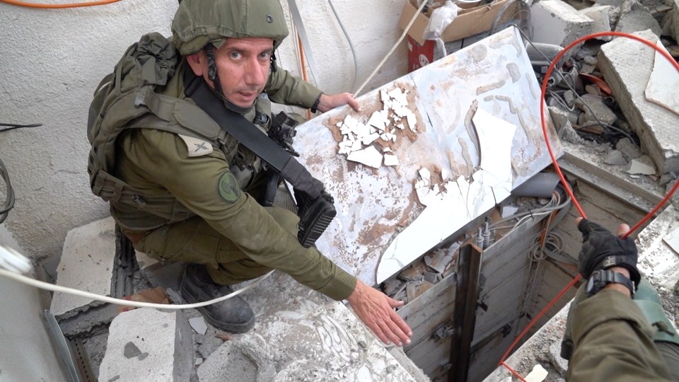 Hagari shows a tunnel found by commandos