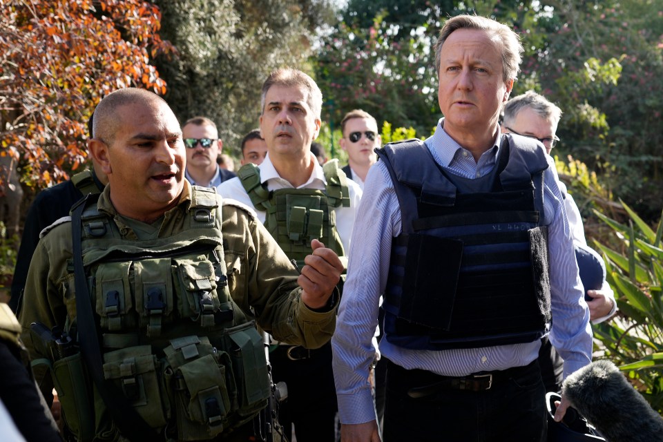 Lord Cameron, pictured with Eli Cohen, visits Kibbutz Be'eri where Hamas terrorists massacred Israeli civilians