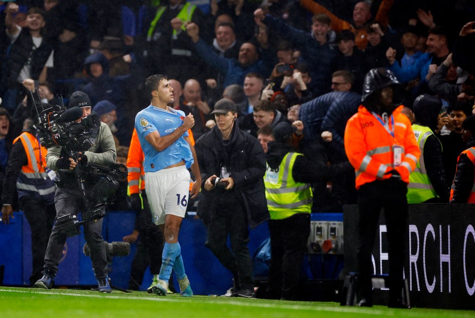 Rodri celebrated in front of the travelling Man City fans