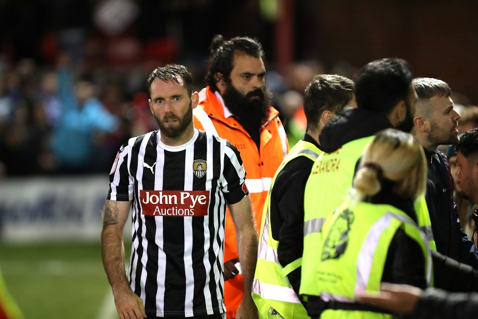 Players tried to calm down the supporters