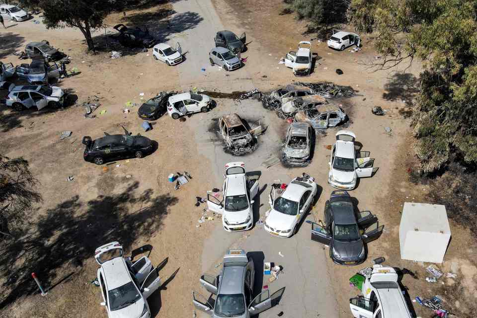 Abandoned and torched vehicles after the October 7 massacre where hundreds were brutally killed