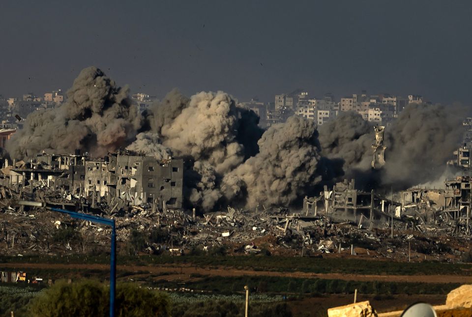 Huge clouds of dust and smoke soar above Gaza following recent Israeli strikes