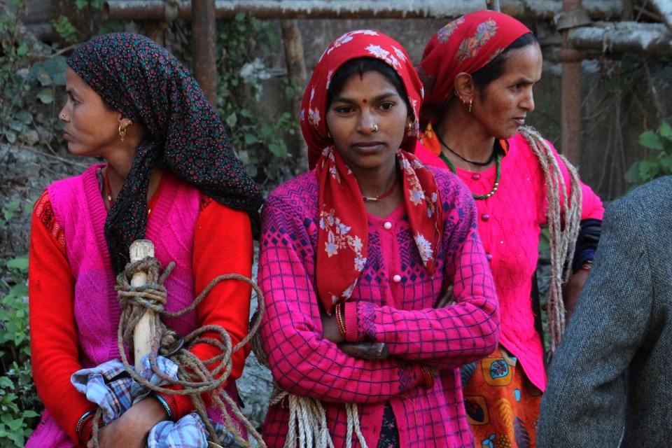 Concerned locals watch the rescue efforts in progress