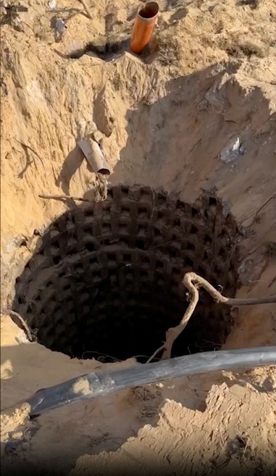 Workers would haul buckets of sewage-soaked soil from the tunnel shafts like this one