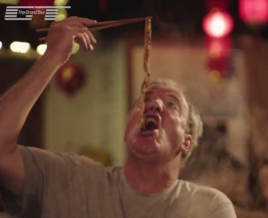 Clarkson stomachs a goose intestine in Chongqing, China