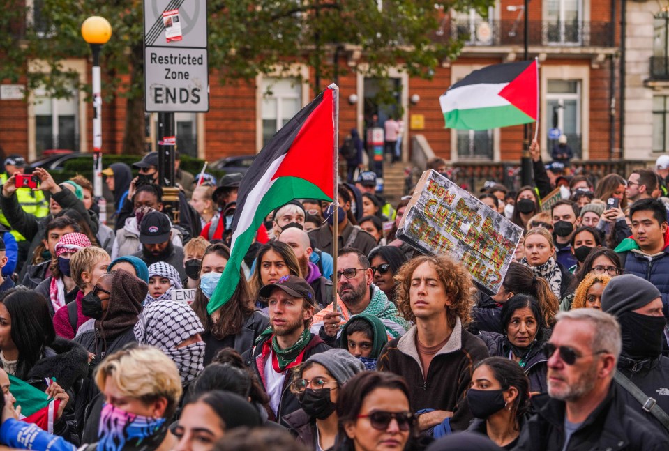 Protesters gather outside the BBC headquarters before marching to a rally Trafalgar Square on November 4