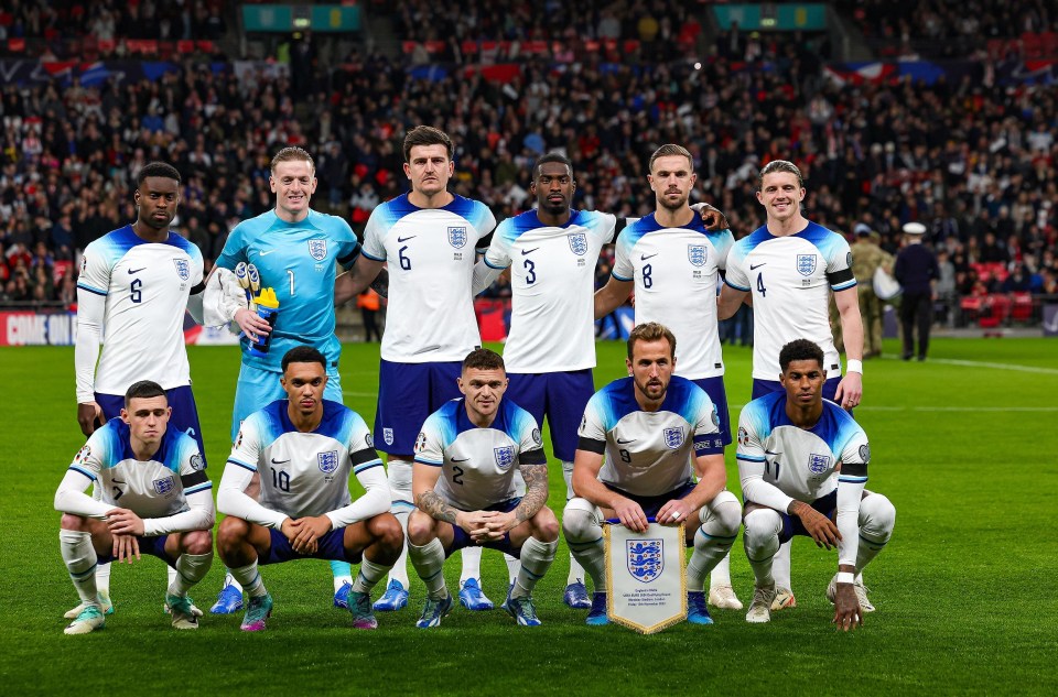 Harry Kane would often pose with the England pennant during the team photo