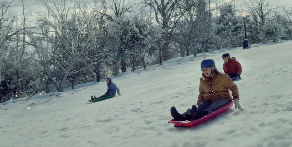 The advert tells the story of three life-long friends reviving the joy of their youth atop a snowy hill, proving that joyful moments are made even more special when they’re shared