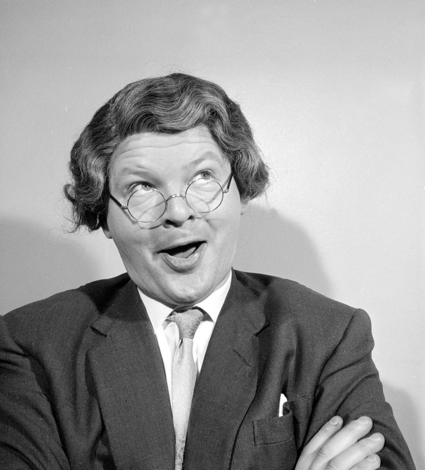 B4R72W Comedian Benny Hill pictured at home wearing a wig and glasses May 1958