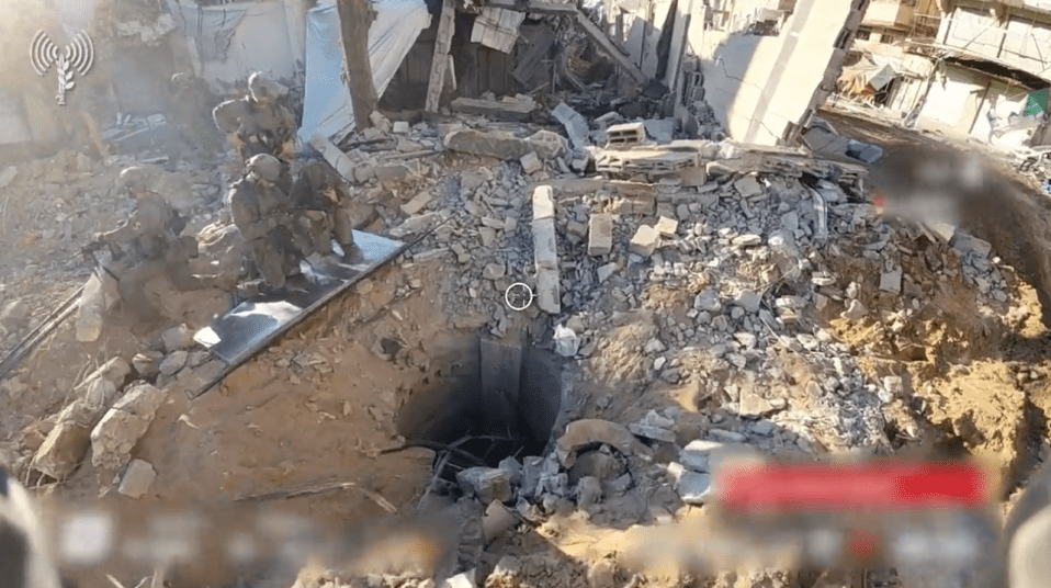 Footage shows a hole in the ground that leads to what the IDF believe is a network of underground tunnels