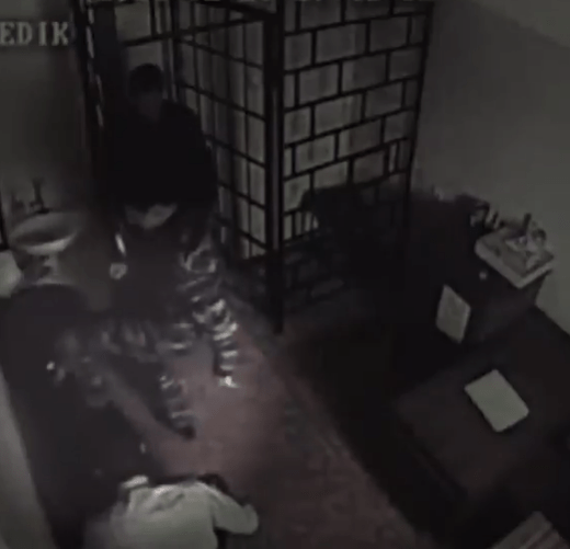 One clip shows a prison guard viciously kicking a prisoner in the head