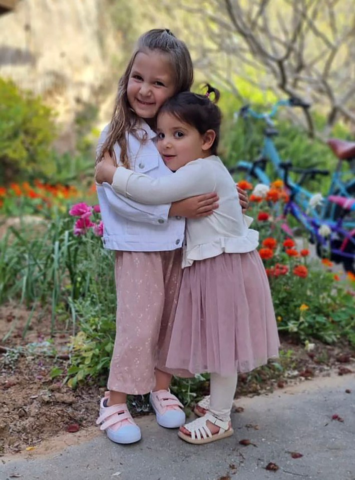 Sisters Aviv, right, and Raz Asher Katz who were released with their mother yesterday