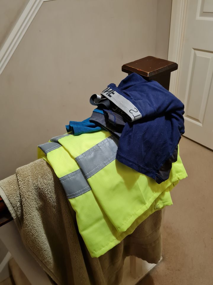 PIC FROM Kennedy News and Media (PICTURED: JASON JORDAN'S, 52, WASHING READY TO BE USED THE NEXT DAY, INCLUDING HI-VIS JACKET, BOXERS AND TROUSERS) A wellness worker dashed to grab a weapon after spotting the 'shadow of a burglar' lurking her landing - only for it to turn out to be a PILE OF WASHING creating a 'Hitchcock-like' side profile. Julia Jordan says her heart was 'bouncing out of her chest' as she considered how to defend herself in her own home last Wednesday evening [Nov 15]. The 59-year-old believed she'd seen an intruder's shadow on one of her bedroom doors but a 'crazy' illusion meant all wasn't as it seemed. DISCLAIMER: While Kennedy News and Media uses its best endeavours to establish the copyright and authenticity of all pictures supplied, it accepts no liability for any damage, loss or legal action caused by the use of images supplied and the publication of images is solely at your discretion. SEE KENNEDY NEWS COPY - 0161 697 4266 ..