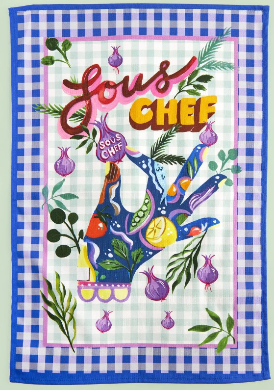 This tea towel is one way to brighten up doing the dishes.