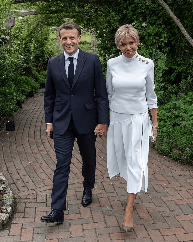 Macron and wife Brigitte attend a drinks reception for Queen Elizabeth II during the G7 Summit in Cornwall