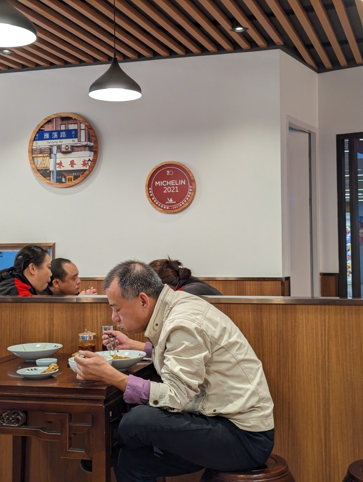 A small plaque on the wall celebrates its Michelin guide entry