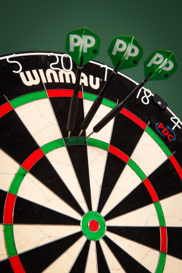 Paddy Power have replaced the red treble 20 spot on the dartboard with a green one