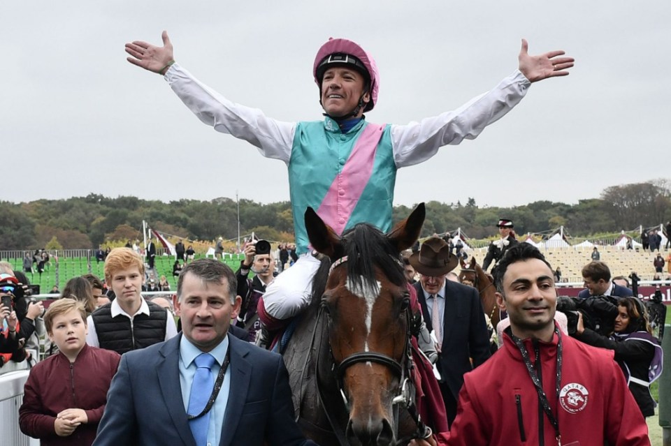 (FILES) In this file photo taken on October 7, 2018, Italian jockey Frankie Dettori on "Enable" celebrates after winning the 2018 Qatar Prix de l'Arc de Triomphe flat race at the ParisLongchamp race track in Paris. - Enable can fashion a dream ending to what started as a "nightmare" year with a victory in the $4 million Breeders' Cup Turf at Churchill Downs on November 3, 2018. The John Gosden-trained filly didn't get her four-year-old season underway until September thanks to a leg injury, but that didn't stop the bay star from winning a second straight Arc on October 7 with Frankie Dettori in the irons. (Photo by Philippe LOPEZ / AFP)PHILIPPE LOPEZ/AFP/Getty Images