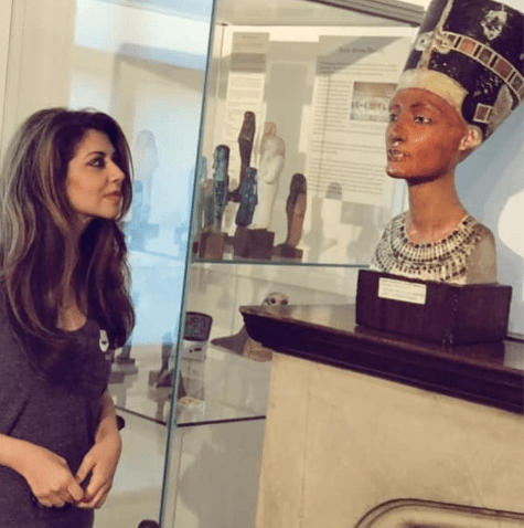 Sofia Aziz standing with the reworked head of Egyptian Queen Nefertiti who many believe might be the woman whose tomb Tutankhamun took over